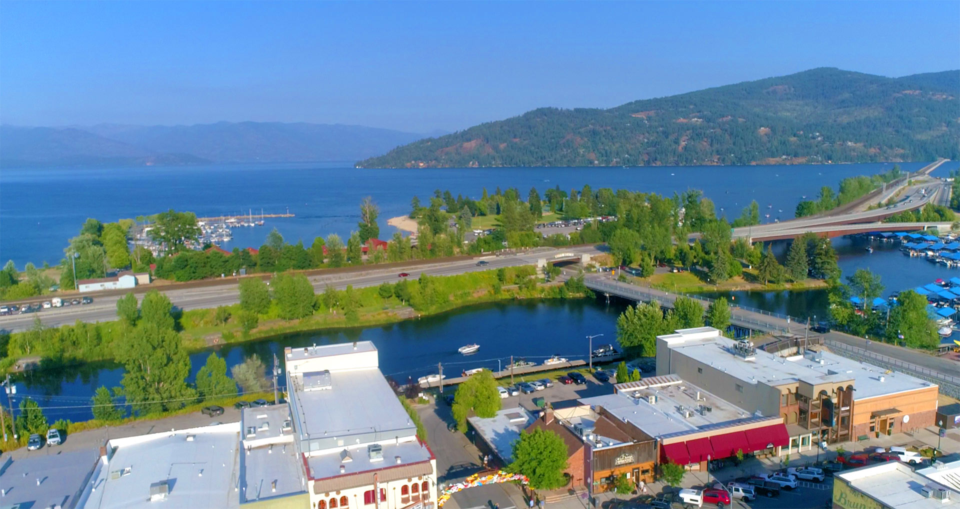 Aerial view of downtown Sandpoint, Sand Creek, and Lake Pend Oreille